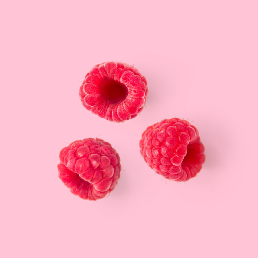 Creative layout made of raspberry and coconut. Flat lay. Food concept.